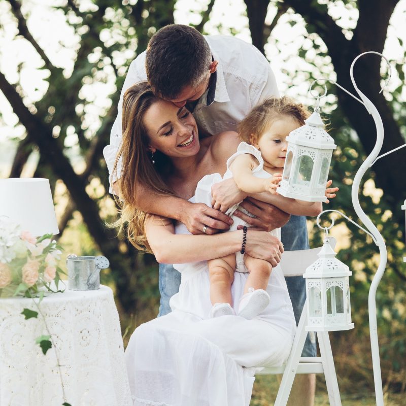 father-mother-daughter-together-picnic-garden.2